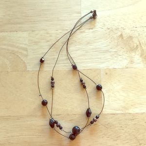 Black wire necklace with black beads